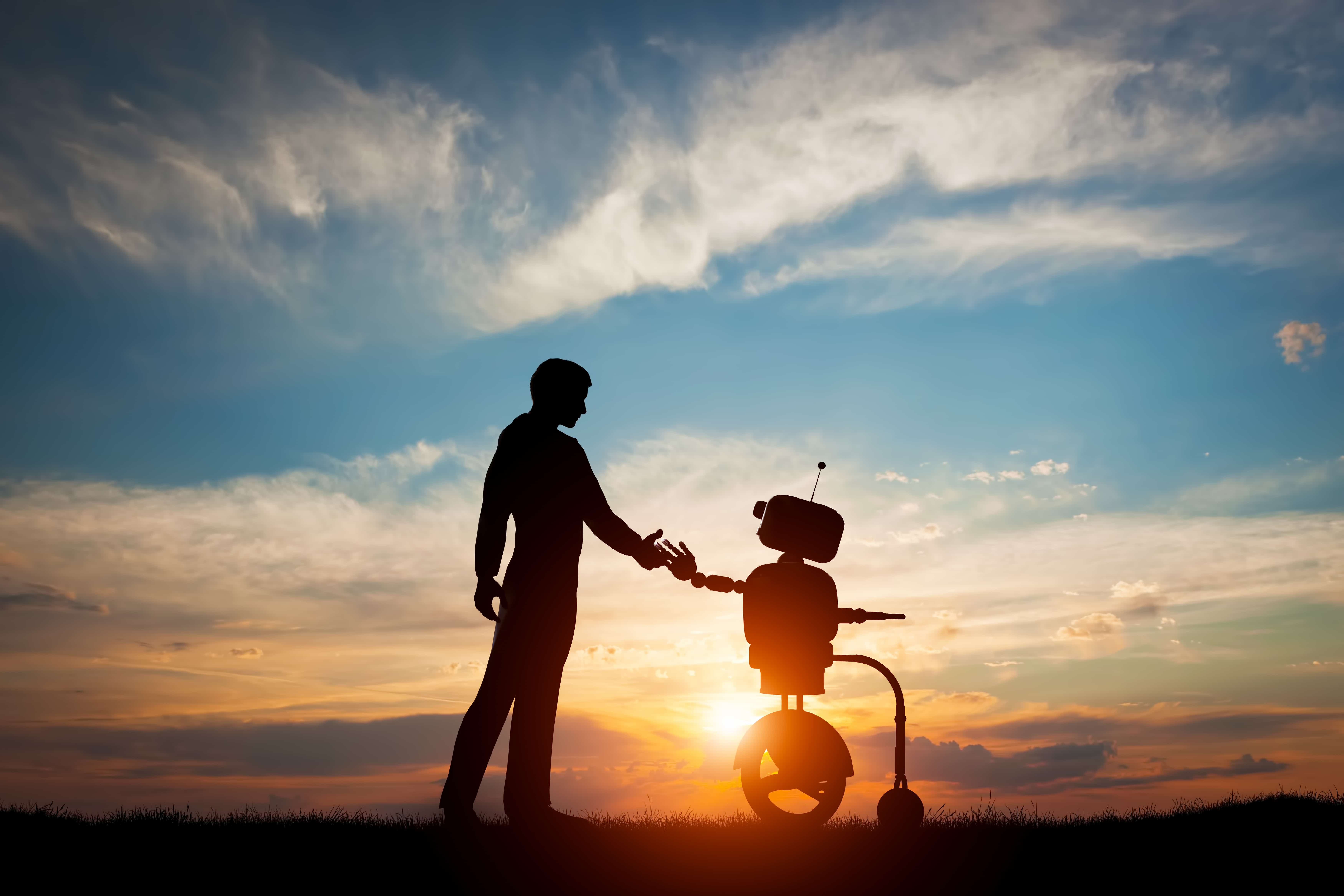 Man and robot greet